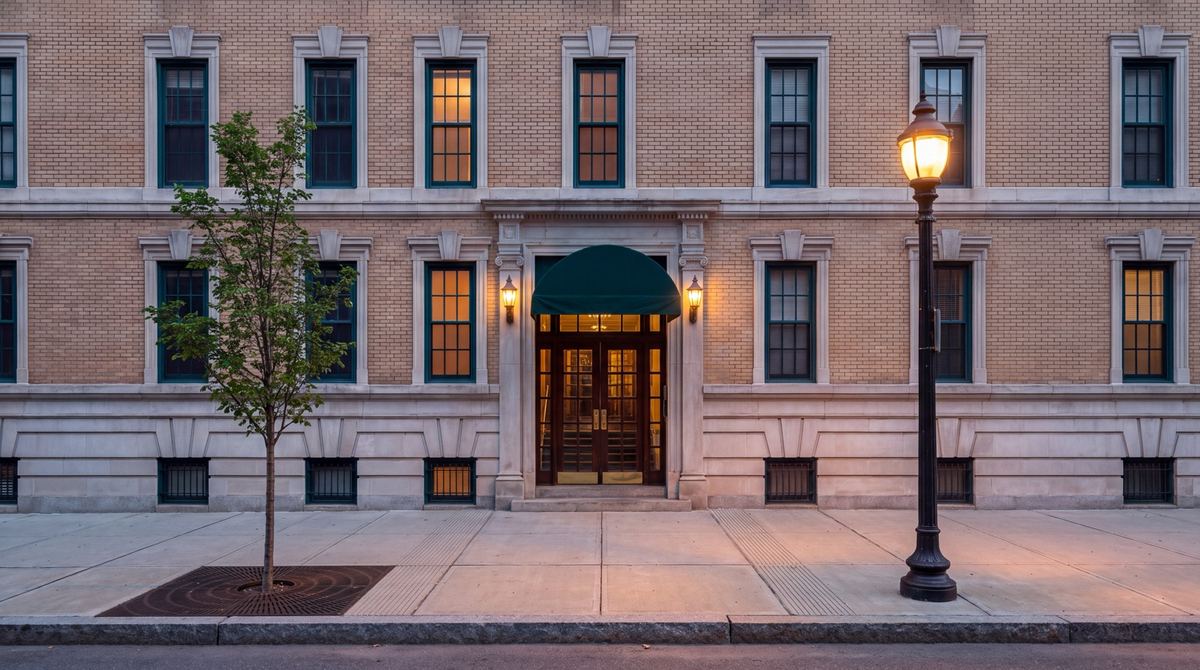 Pre-war apartment house at dusk